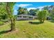 Charming single-story home with inviting front porch and well-manicured lawn, set against a blue sky at 3951 Lindley Dr, Powder Springs, GA 30127