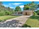 Charming single-story home with a front porch, carport, and a well-maintained front yard at 3951 Lindley Dr, Powder Springs, GA 30127