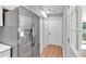 Stainless steel refrigerator conveniently located near pantry and entrance providing modern convenience at 3951 Lindley Dr, Powder Springs, GA 30127