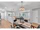 Open concept featuring dining area transitioning to living room, providing great flow and natural light at 3951 Lindley Dr, Powder Springs, GA 30127