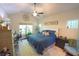 Charming bedroom featuring vaulted ceilings, neutral walls, ceiling fan and a decor at 453 Mulberry Rock Rd Rd, Temple, GA 30179