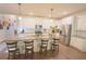 Modern kitchen featuring a spacious island, granite countertops, stainless steel appliances, and ample cabinet space at 453 Mulberry Rock Rd Rd, Temple, GA 30179