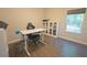 Bright and modern office space with a desk, comfortable chair, and ample storage at 453 Mulberry Rock Rd Rd, Temple, GA 30179