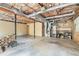 Unfinished basement showing exposed duct work, water heater, and storage shelves at 929 Hampton Nw Trl, Lilburn, GA 30047
