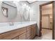 Bathroom with a double sink vanity, and access to walk-in closet at 929 Hampton Nw Trl, Lilburn, GA 30047