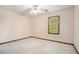 Bedroom featuring neutral carpet and walls, ceiling fan, and window for natural light at 929 Hampton Nw Trl, Lilburn, GA 30047