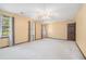 Large bedroom featuring neutral walls, ceiling fan, and multiple windows providing ample natural light at 929 Hampton Nw Trl, Lilburn, GA 30047