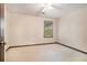 Bright bedroom with neutral carpet, a ceiling fan, and a window overlooking the yard at 929 Hampton Nw Trl, Lilburn, GA 30047