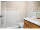 Bright bathroom featuring a neutral color scheme, pedestal sink, and modern fixtures at 1188 To Lani Farm Rd, Stone Mountain, GA 30083