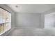 Spacious room with large windows and plush carpeting at 1188 To Lani Farm Rd, Stone Mountain, GA 30083