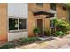 Charming brick condo with a covered entryway, and beautiful landscaping around the house at 148 Waverly Way # 10, Atlanta, GA 30307