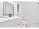 Stylish bathroom with marbled shower, vanity, and natural light at 1633 Clifton Downs Ct, Kennesaw, GA 30144
