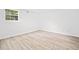 Bedroom with hardwood floors and bright lighting at 1633 Clifton Downs Ct, Kennesaw, GA 30144