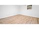 Bright bedroom featuring new vinyl plank flooring and fresh white paint at 1633 Clifton Downs Ct, Kennesaw, GA 30144