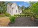 Charming two-story home with landscaped yard, showcasing its curb appeal at 1633 Clifton Downs Ct, Kennesaw, GA 30144