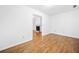 Open living space featuring hardwood floors and view to fireplace room at 1633 Clifton Downs Ct, Kennesaw, GA 30144