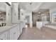 Elegant bathroom with double vanity, glass shower, soaking tub, and ceramic tile flooring at 2932 Springbluff Ln, Buford, GA 30519