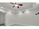 Well-lit bedroom with a ceiling fan and neutral-toned walls at 2932 Springbluff Ln, Buford, GA 30519