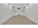 Bright bonus room with built-in shelves and neutral flooring at 2932 Springbluff Ln, Buford, GA 30519