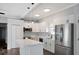 Bright kitchen with island, stainless appliances, and modern lighting at 3087 Semmes St, Atlanta, GA 30344