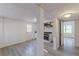 Open-plan finished basement area features a kitchenette and updated bathroom, offering convenience and modern appeal at 4639 Hardwood Rd, Stone Mountain, GA 30083