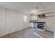 Basement kitchenette features ample counter space, modern appliances, and convenient basement access to the outside at 4639 Hardwood Rd, Stone Mountain, GA 30083