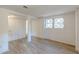 The finished basement features durable flooring and a large window, offering potential as a rec room or additional living space at 4639 Hardwood Rd, Stone Mountain, GA 30083