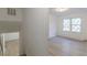 This bedroom features sleek hardwood floors and a window for natural light at 4639 Hardwood Rd, Stone Mountain, GA 30083