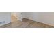 The bedroom features sleek hardwood floors, and doorways at 4639 Hardwood Rd, Stone Mountain, GA 30083
