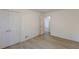 This bedroom features sleek hardwood floors, closet and a doorway at 4639 Hardwood Rd, Stone Mountain, GA 30083