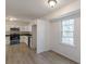 Modern kitchen with stainless steel appliances and white cabinetry, showcasing new renovations at 4639 Hardwood Rd, Stone Mountain, GA 30083