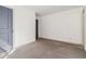 A cozy bedroom with gray carpeting, and light gray trim with a complementing door at 2206 Loring Ct, Decatur, GA 30032