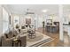 Open-concept living room seamlessly connects to a modern kitchen, perfect for entertaining at 2206 Loring Ct, Decatur, GA 30032