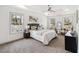 Spacious main bedroom with tray ceilings, large windows, and modern furniture at 2206 Loring Ct, Decatur, GA 30032