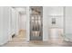 Hallway featuring new flooring, fresh paint, and ample natural light, creating a welcoming and bright space at 3362 Alexis Ct, Marietta, GA 30066