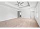Large main bedroom with tray ceiling, neutral carpet, two windows and doorways to an en suite and closet at 3362 Alexis Ct, Marietta, GA 30066