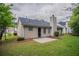 Secluded backyard with a patio, perfect for enjoying nature and privacy at 4096 Waldrop Hills Dr, Decatur, GA 30034