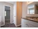 Bathroom vanity with granite countertop, leading to the bedroom at 4096 Waldrop Hills Dr, Decatur, GA 30034
