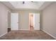 Bedroom featuring plush carpet and neutral walls, with doorways offering access to other areas at 4096 Waldrop Hills Dr, Decatur, GA 30034