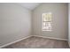 Neutral bedroom with plush carpet, window, and simple design at 4096 Waldrop Hills Dr, Decatur, GA 30034