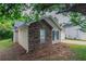 Charming home with a stone accent wall and well-maintained lawn at 4096 Waldrop Hills Dr, Decatur, GA 30034