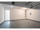 Spacious garage with high ceilings and easy access to the home's interior at 4096 Waldrop Hills Dr, Decatur, GA 30034