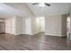 Open layout with hardwood floors, leading to multiple rooms at 4096 Waldrop Hills Dr, Decatur, GA 30034