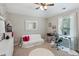 Bright bedroom featuring a stylish workspace, comfortable seating, and a window view, perfect for a home office at 7031 Palomino Trl, Winston, GA 30187