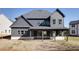 Exterior of home with siding and a large backyard at 750 Garden Reserve Ln, Alpharetta, GA 30005