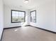 Bedroom with large windows offering natural light, perfect for a cozy space at 750 Garden Reserve Ln, Alpharetta, GA 30005