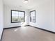 Bedroom showcasing hardwood floors, white walls, with black baseboards and window trim at 750 Garden Reserve Ln, Alpharetta, GA 30005