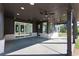 Spacious covered patio with ceiling fans, recessed lighting, and a view of the backyard at 750 Garden Reserve Ln, Alpharetta, GA 30005
