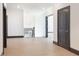 Bright hallway with hardwood floors and modern lighting at 750 Garden Reserve Ln, Alpharetta, GA 30005