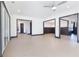 Open-concept living room with hardwood floors and stylish gray trim connecting to other living spaces at 750 Garden Reserve Ln, Alpharetta, GA 30005
